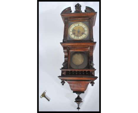 A Victorian HAC - Hamburg America regulator wall clock of architectural form having 8 day movement with decorative facia.