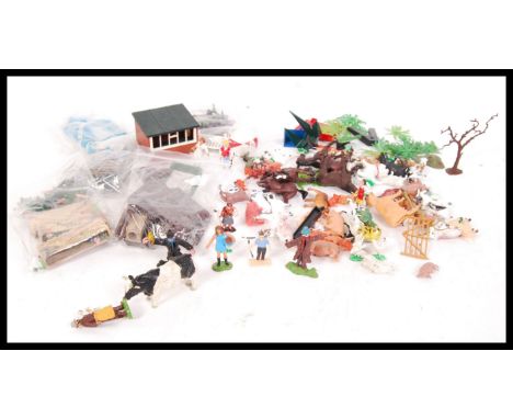 An assortment of 1970's retro vintage Britains farm yard toys and accessories to include other similar period farm yard anima