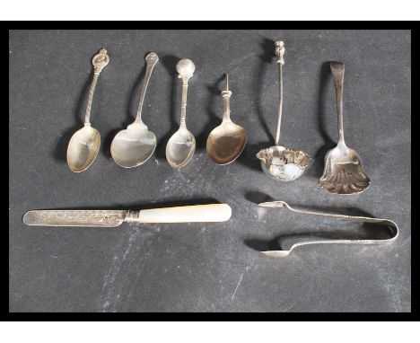 A collection of hallmarked silver flatware to include a pair of sugar tongs Birmingham&nbsp;Charles Wilkes 1902 , Mappin and 