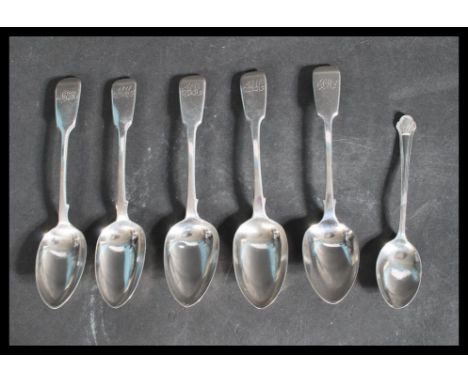 A group of six silver hallmarked spoons to include a set of three Georgian table spoons fiddle pattern London 1834&nbsp;John 