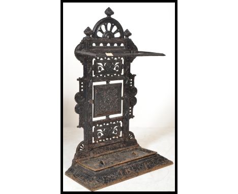 A Victorian 19th century aesthetic movement cast iron two section stick stand in the manner of Coalbrookdale. Of large form h