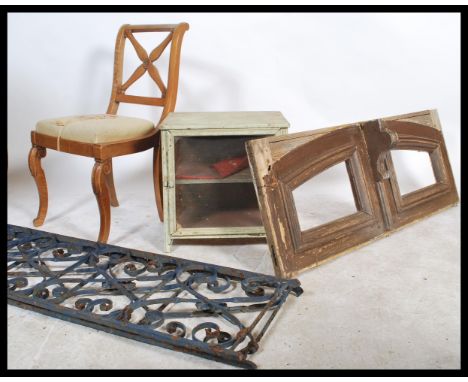 A collection of French furniture to include a single dining chair, a vintage painted wall hanging meat safe an unusual shaped