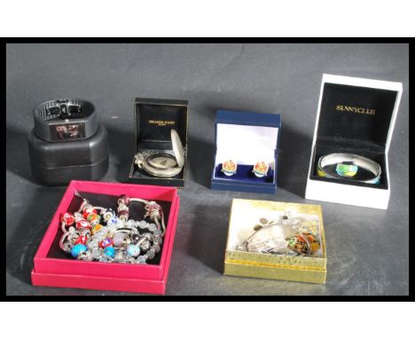 A collection of vintage costume jewellery to include pandora style bracelets , enamel cuff links , Rosendal watch in box , br