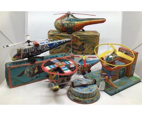 Tinplate: A collection of assorted vintage tinplate helicopters including Police Helicopter (Japan), boxed, HK 565, Germany, 