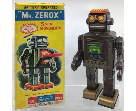 Tinplate: A vintage tinplate battery operated Mr Zerox robot made in Japan by Horikawa (SH) for Telsalda. Rare Gold Feet vers