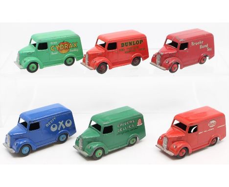 Dinky: A collection of five unboxed Trojan Vans, comprising: Beefy OXO; Brooke Bond Tea; Cydrax; Chivers Jellies; Dunlop; and