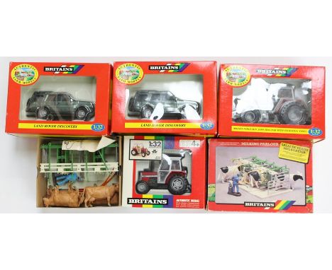 Britains: A collection of five boxed Britains items to comprise: Massey Ferguson 3680 Tractor with Flotation Tyres, No. 9441;