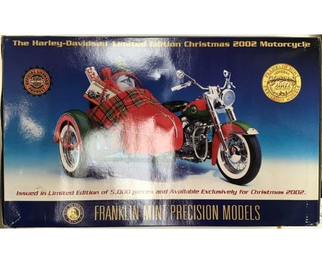 Franklin Mint: A boxed,&nbsp;Harley Davidson Christmas 2002 limited edition. In original packaging with accessories and bookl