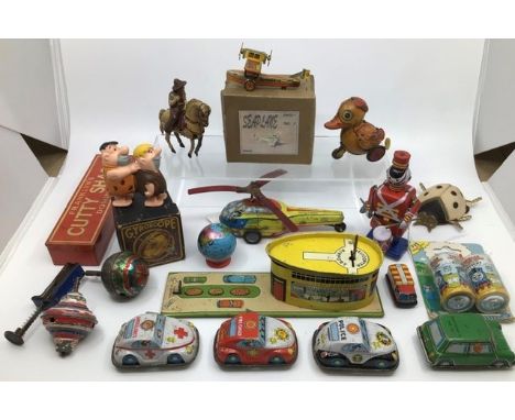 Tinplate: A collection of assorted vintage tinplate including German clockwork horse &amp; rider (not working), Triang clockw