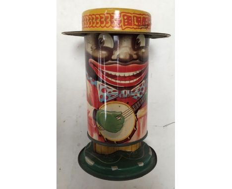 Tinplate: A circa mid-20th century, vintage, tinplate money box with spring action, his legs grow longer as money is added, M