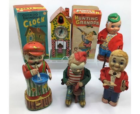 Tinplate: A collection of assorted vintage tinplate clockwork to include: Nomura Japan Hunting Grandpa, some damage,boxed, Ba