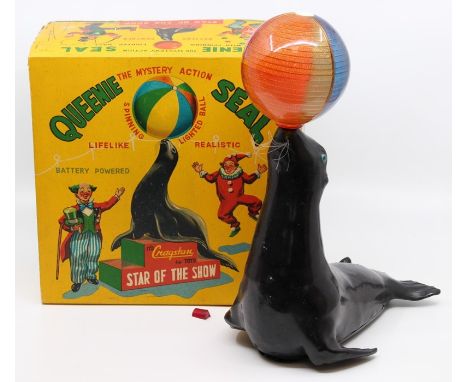 Cragstan: A boxed, Queenie Seal, Mystery Action, Made in Japan for Cragstan, complete with ball that lights up, tape repairs 