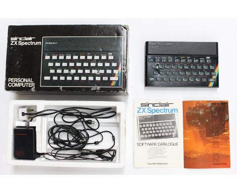 Spectrum: A boxed ZX Spectrum Personal Computer, 48K Ram, complete with instructions, box worn, slight damage to console; tog