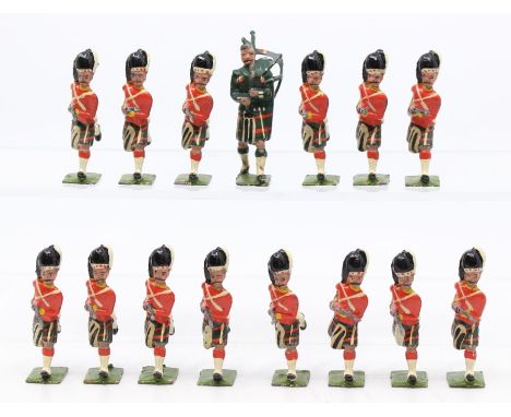 Britains: A collection of assorted Britains Highlanders, dated 1903 to bases, fifteen figures, slight paint losses and wear c