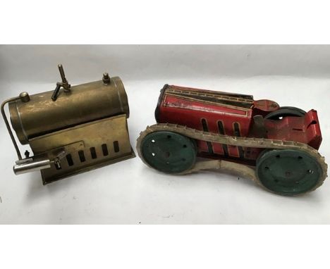 Tinplate: A vintage tinplate clockwork Tractor made by Marx, c 1935, working mechanism, tracks missing on one side, perished 