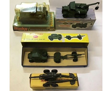 Dinky: A collection of four Dinky military vehicles to include: Striker Anti-Tank Vehicle 691, Recovery Tractor 661, some box