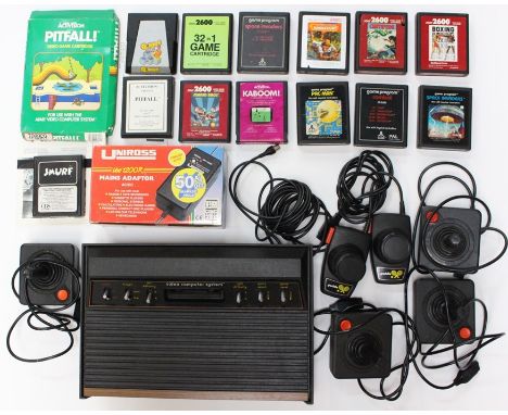 Atari: An Atari 2600 VCS console, with two paddles, four joysticks and adaptor; together with twelve various unboxed Atari 26