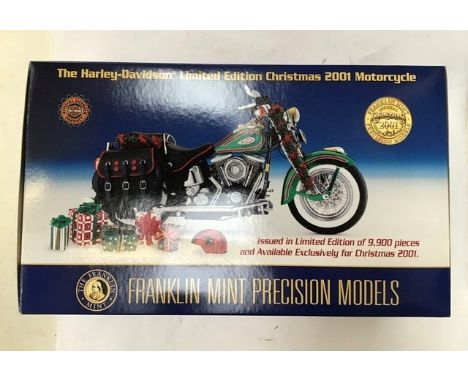 Franklin Mint: A boxed, Harley Davidson Motorcycle 1:10 scale model. Limited edition Christmas 2001. In original box with all