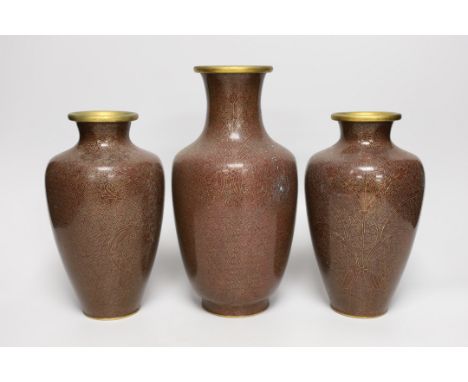 A pair of Chinese cloisonné enamel vases and another (3) 26cms