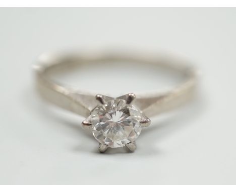 A modern Swedish 18k white metal and solitaire diamond set ring, size K, gross weight 2.6 grams, the stone weighing approx. 0