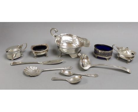 A George V silver sauce boat, Chester 1911, together with four silver condiments, a Georgian silver sauce ladle by William Ba