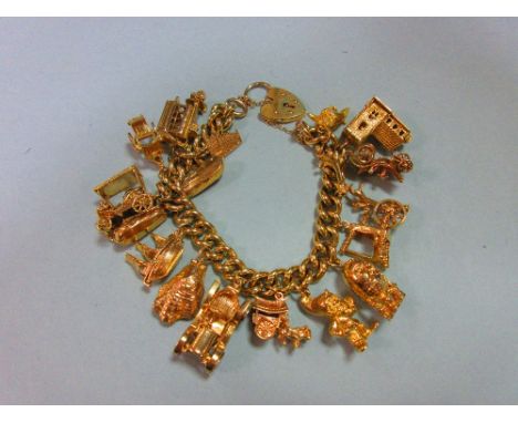 A 9ct gold charm bracelet with 17 charms, the substantial curb link bracelet, hallmarked Sheffield 1978, with heart locket, h
