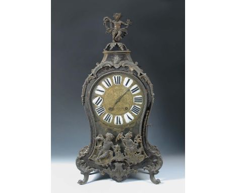 A French 18th century Boullework mantel clock, the waisted case with gilt metal mounts, enamelled numerals and signed below '