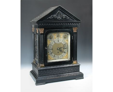 Thomas Russell & Son, London, an imposing Victorian ebonised case chiming clock, the architecturally moulded case with tile-e