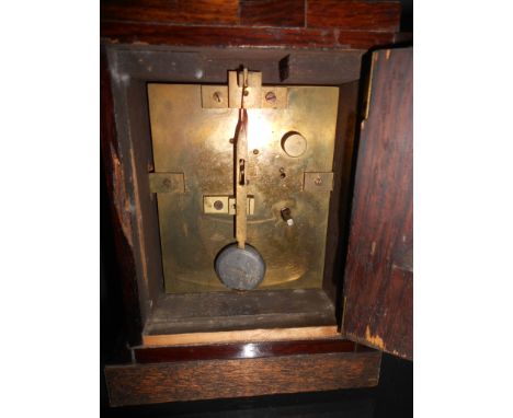 A small late Victorian rosewood mantel timepiece, the engraved rectangular gilt mask signed 'James Kirby Saint Neots' around 
