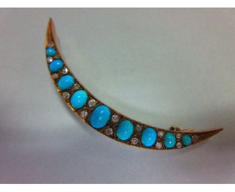 A turquoise and diamond crescent brooch, the open crescent set with graduated oval cabochon turquoises separated by pairs of 