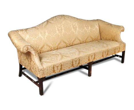 An 18th century style mahogany sofa, with camel back and outscrolling arms, on pierced mahogany stretchered legs 91 x 116 x 7