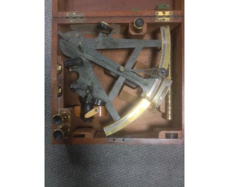 A 'George Lee and Son, Portsmouth' labelled mahogany cased sextant, the rosewood handled instrument with blackened quadrant a