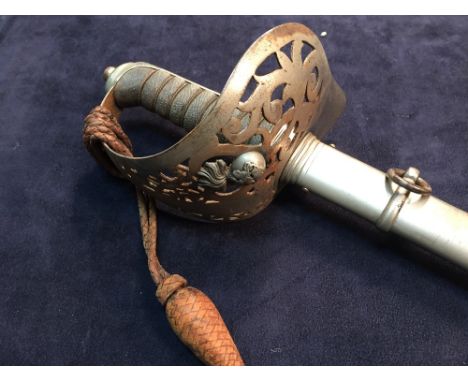 A 19th century officer's sword by Thurkle, the blade decorated with Northumberland V Fussiliers battle honours and crest, wit