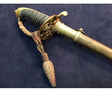 A Victorian officer's dress sword, with etched blade, unsigned, VR ciphers, pierced guard with braided tassel and shagreen gr