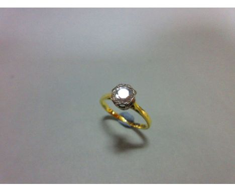 A single stone diamond ring, the illusion set round brilliant cut diamond, estimated weight 0.40cts, to a plain band, size L,