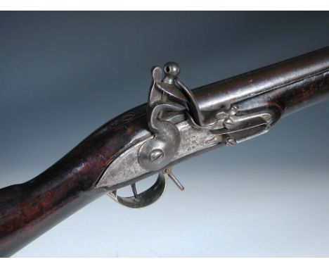 A George III Long Land pattern 'Brown Bess' service musket, circa 1800, with browned barrel, Tower proofs, rounded top-tang, 