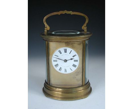 A French giant oval carriage clock, circa 1890, with silvered platfom lever escapement, enamel 8.5cm (3.5in) dial marked 'Jan