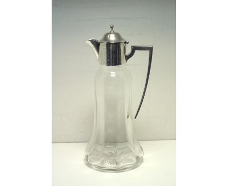 A plain glass claret jug with silver mount, by William Hutton & Sons, Birmingham 1919, the bell shaped body with plain silver