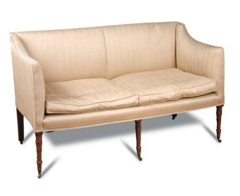 A Regency square back sofa, with loose cushion seat, on six ring turned front legs and casters 90 x 148 x 71cm (35 x 58 x 28i