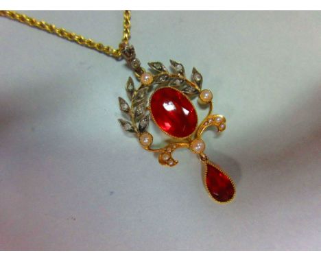 A belle époque fire opal, diamond and seed pearl pendant with chain, the oval cut fire opal collet set beneath an open arch o