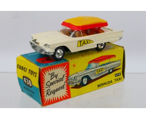 Corgi Toys - A boxed Corgi Toys #430 Ford 'Bermuda' Taxi. The model with white body, with yellow and red canopy, yellow inter