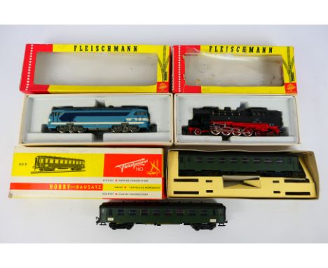 Fleischmann - 2 x boxed HO gauge locomotives, a 2-8-4 steam engine and an SNCF Diesel # 1386 and 2 x coaches, one boxed, one 