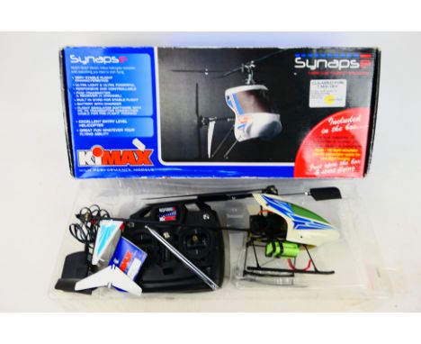 KiMax - A boxed Synapse ready built RC helicopter. The model shows some signs of use appearing to be in Good condition genera