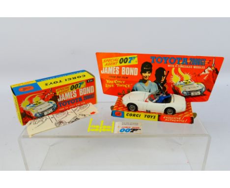 Corgi - An original Corgi 336 James Bond Toyota 2000GT. Item appears to be in good-very good condition, missing 3 of it 4 mis