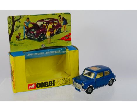 Corgi - #334 Mini Cooper Magnifique, with metallic blue body, cream interior, red & yellow sun roof, spun hubs - some slight 