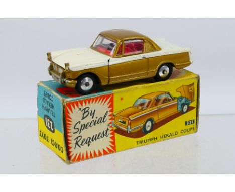 Corgi - An original Corgi 231 Triumph Herald Coupe with opening bonnet. Item appears to be in very good-excellent condition. 