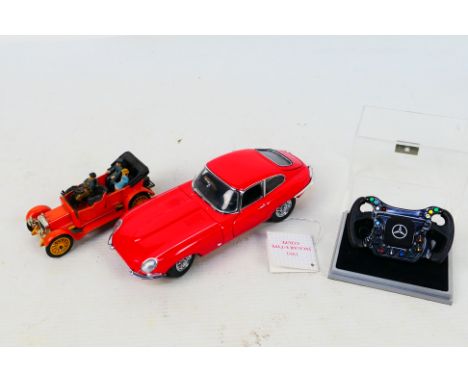 Amalgam - Franklin Mint - Corgi - A 1/4 scale McLaren Mercedes MP4-22 steering wheel from 2007. A Franklin Mint Jaguar E Type