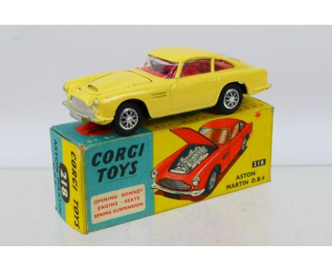 Corgi - An original Corgi 218 Aston Martin D.B.4 with opening Bonnet. Item appears to be in very good-excellent condition. Co