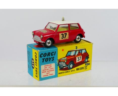 Corgi - A boxed BMC Mini Cooper S Monte Carlo Rally model # 317. The car appears in Very Good condition with light signs of p
