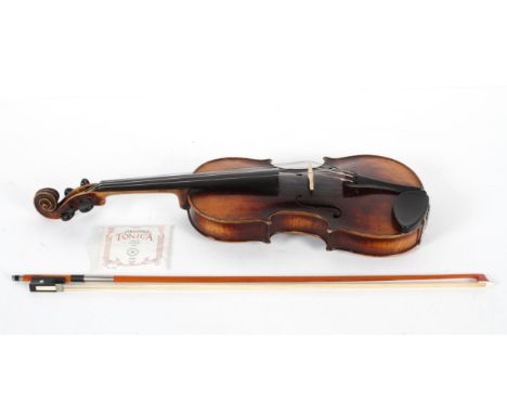 A violin with a two piece back, Stradivarius paper label, total length 60cm; together with a Cathedral bow